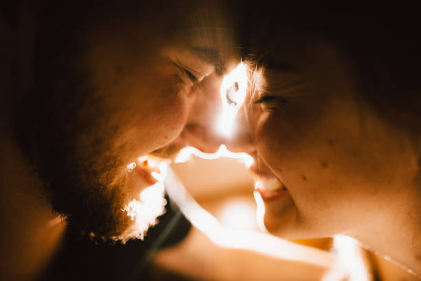 Portrait of young heterosexua couple resting at home.