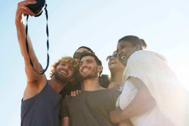 istock Selfie of friends 938095856