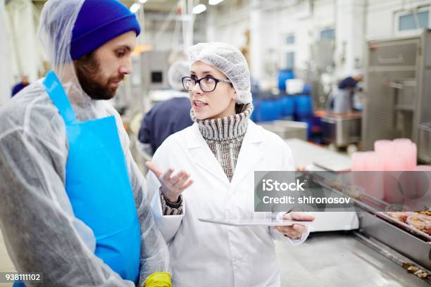 Discussing Work Stock Photo - Download Image Now - Discussion, Two People, Digital Tablet