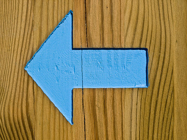 istock Blue Arrow on a Wooden Plank 93811212