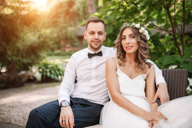 istock the bride and groom sit on a chair 938113730