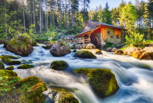 Austria landscape with waterfall and watermill near Salzburg, Golling Alps