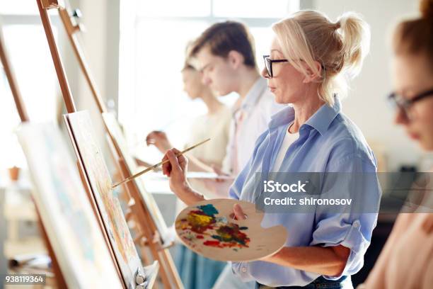 Woman Painting Stock Photo - Download Image Now - Painting - Activity, Painting - Art Product, Learning