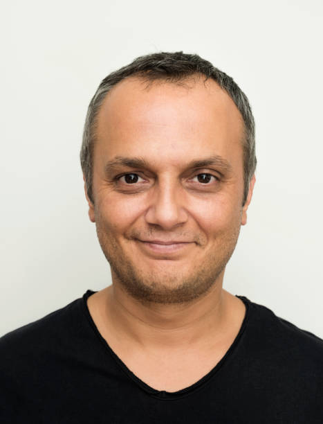 istock Close-up portrait of man smiling 938127566