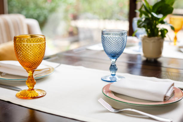 istock blue and orange wine glasses 938127612