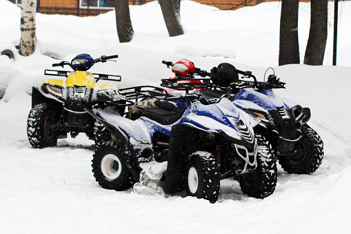 Winter Motorcycle. Snowmobile. Winter ATVs. Winter ATVs in winter