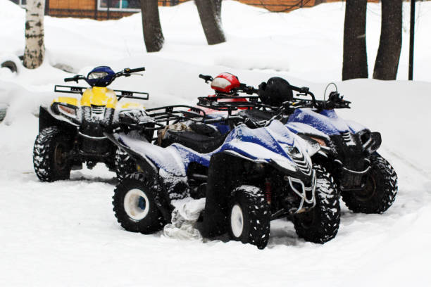 Winter Motorcycle. Snowmobile. Winter ATVs. Winter Motorcycle. Snowmobile. Winter ATVs. Winter ATVs in winter Snowmobiling stock pictures, royalty-free photos & images