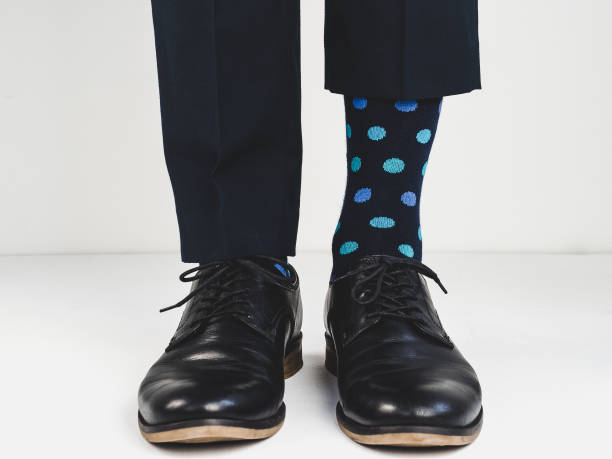 istock Stylish shoes and bright socks 938138032
