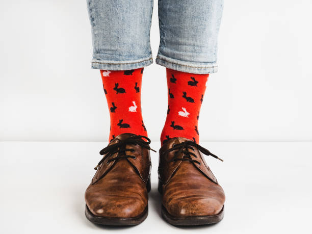 istock Stylish shoes and bright, funny, happy socks 938138444