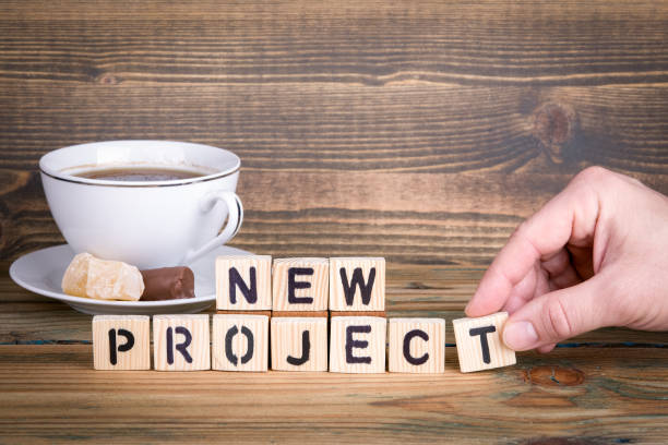 istock new project. Wooden letters on the office desk 938138508