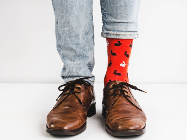 istock Stylish shoes and bright, funny, happy socks 938138520