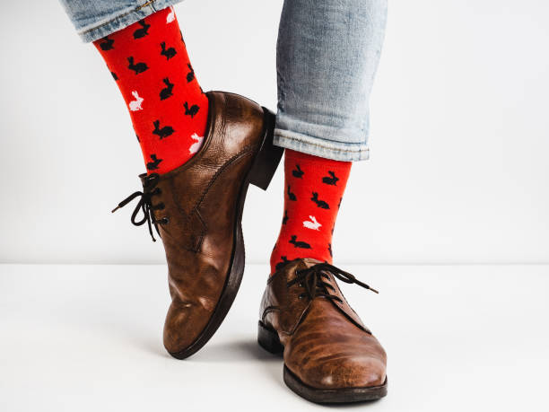 istock Stylish shoes and bright, funny, happy socks 938138580