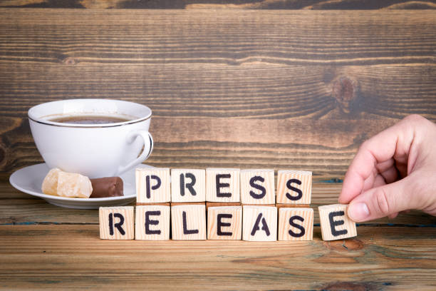 istock press release. Wooden letters on the office desk 938138656