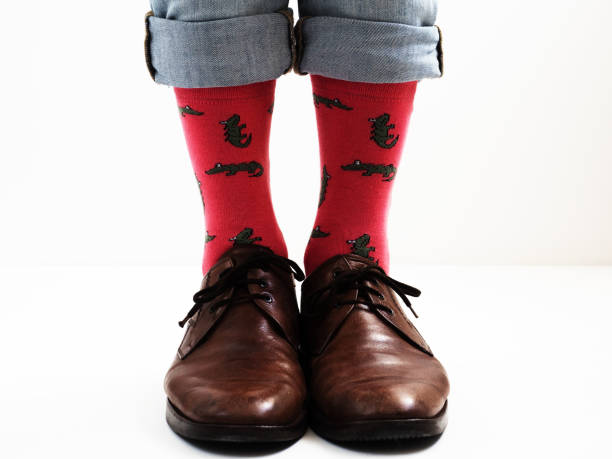 istock Stylish shoes and bright, funny, happy socks 938138704