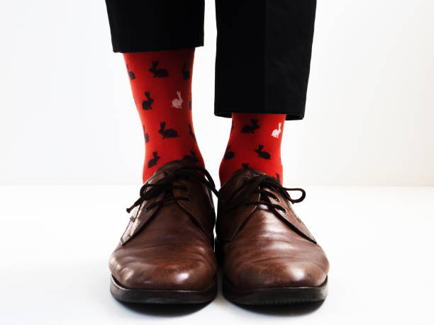istock Stylish shoes and bright, funny, happy socks 938138722
