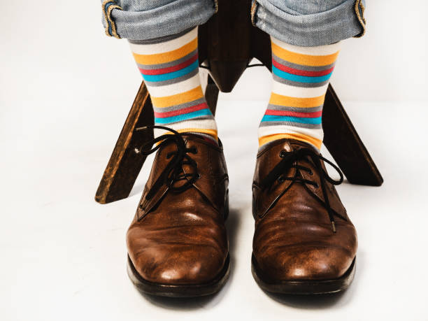 istock Stylish shoes and bright, funny, happy socks 938138806