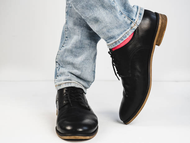 istock Stylish shoes and bright socks 938140902