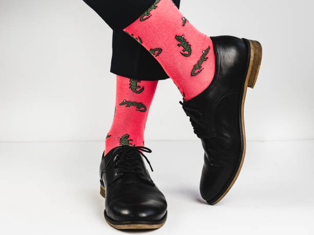 istock Stylish shoes and bright, funny, happy socks 938140974