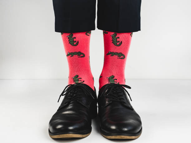 istock Stylish shoes and bright, funny, happy socks 938141176