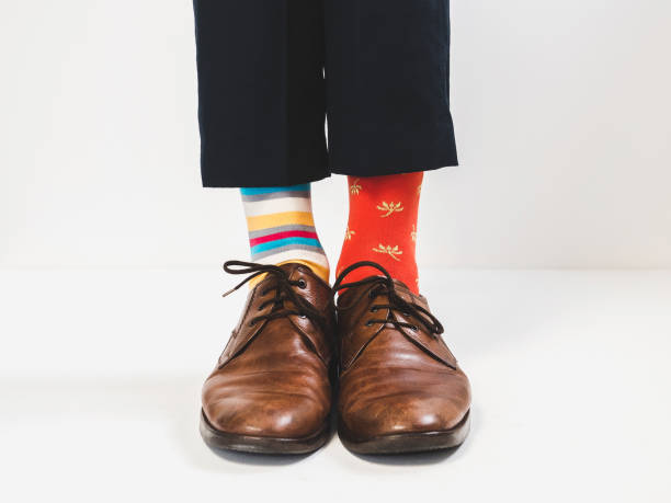 istock Stylish shoes and bright, funny, happy socks 938141406