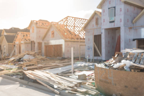 istock Blurred abstract wood frame house under construction in Irving, Texas, USA 938145110