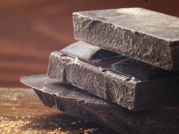 istock Black chocolate close-up, macro photo. 938146446