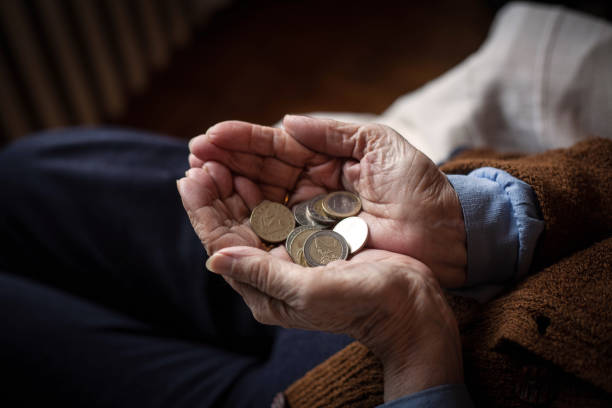 istock Pensioner and money. 938155116