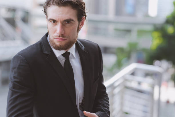 istock Confident young business man in black tie portrait. 938155606