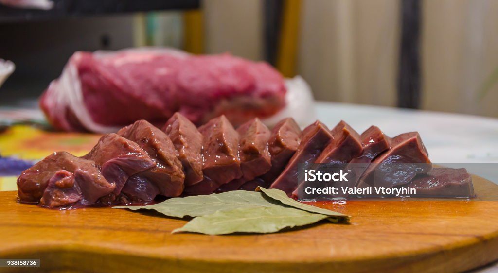 fresh and raw liver on white background Beef Stock Photo