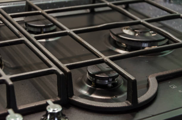 istock Stainless steel gas hob isolated on white 938158954