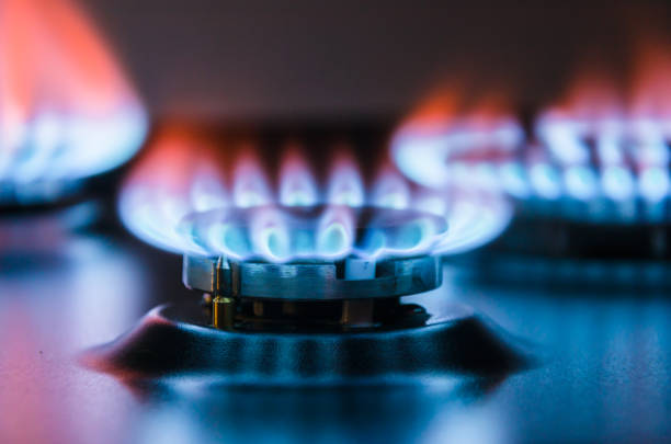 Burning gas burner. Burning gas burner. Blue fire with a red flame. burner stove top photos stock pictures, royalty-free photos & images