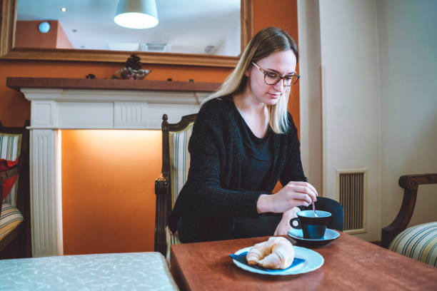 istock Young woman enjoying her coffee 938161840