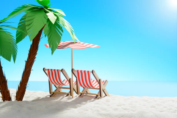 istock Two sun loungers under a palm tree on the sandy coast. Sky with copy space 938165252