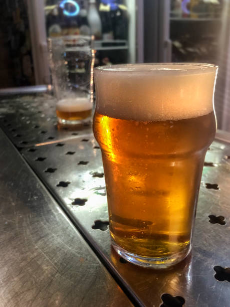 istock Beer pint glass at pub counter in Brazil 938166418