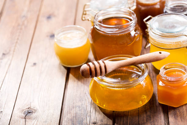 istock various types of honey in glass jars 938175402
