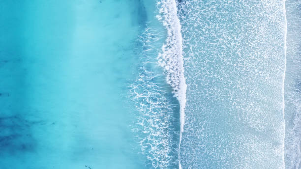 istock Wave on the beach as a background. Beautiful natural background at the summer time 938176452