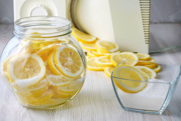 istock Sliced lemons with sugar in a can. 938188986