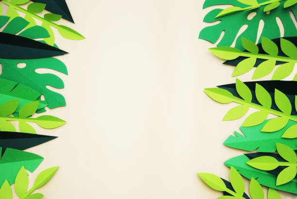 istock Summer Tropical Paper Cut leaves, Frame. Exotic summertime. Space for text. Beautiful dark green jungle floral background. Monstera, palm. 938193656