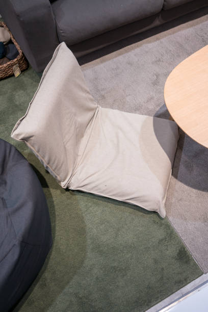 istock Living corner in modern style with grey foldable cushion on carpet. 938194612