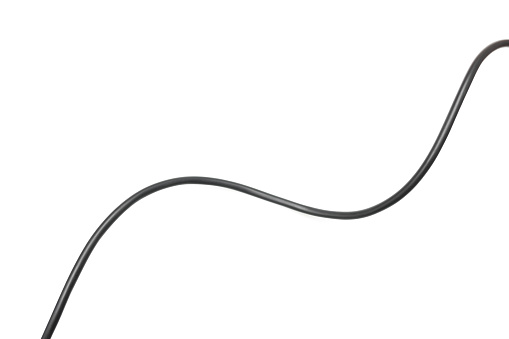 Black wire cable isolated on a white background abstraction.