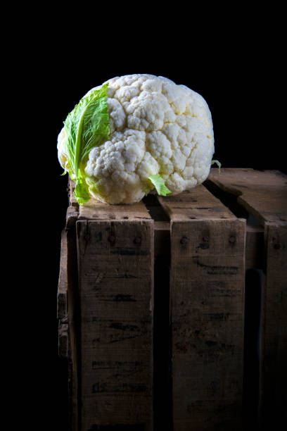 istock Cauliflower in dark food photography style 938199376