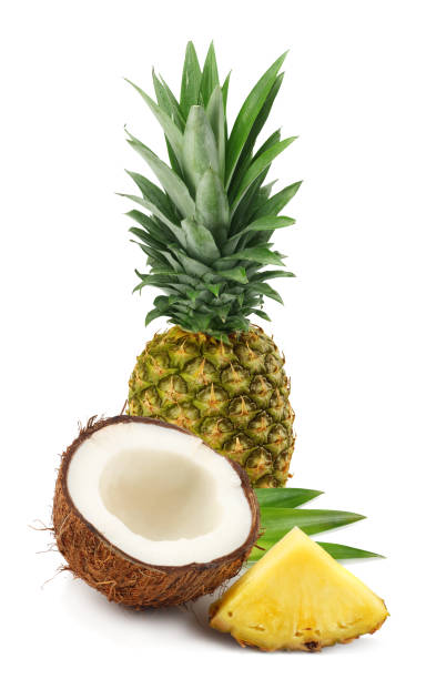 istock Coconut with pineapple and green leaves isolated on white background 938204338