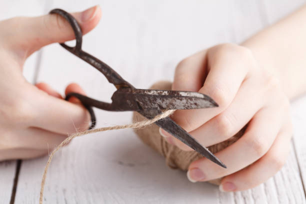 istock Cuting twine rope for packing gift 938204578