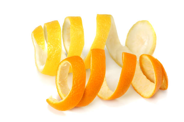 istock fresh orange and lemon peels isolated on white background 938204864