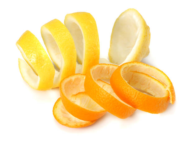 istock fresh orange and lemon peels isolated on white background 938204896