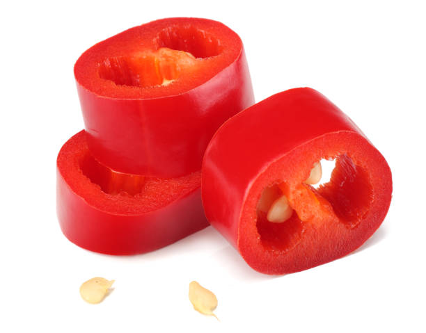 istock sliced red hot chili peppers isolated on white background 938204930