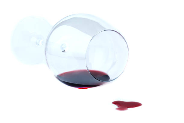 istock dirty wine glass lay on white 938206278