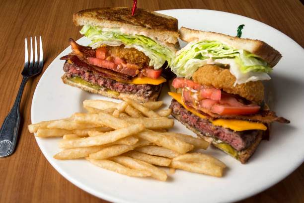 istock Beef Onion Ring Club Sandwich 938209618