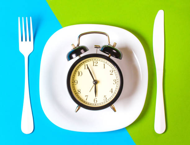 istock lunch plate fork knife Cutlery Kitchen concept restaurant menu meal art background blue green 938210372