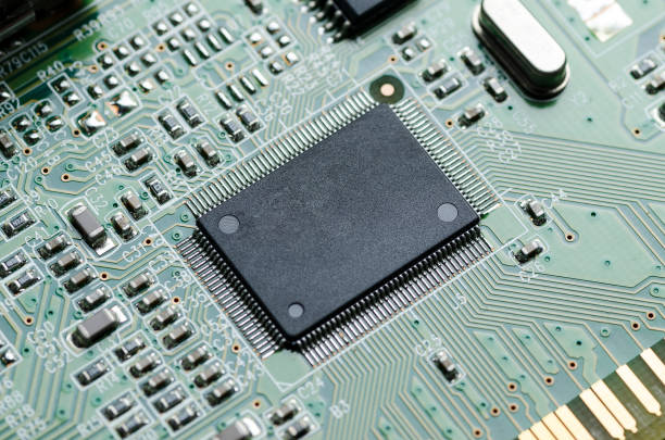 istock A microchip in the center of the printed circuit Board 938214810
